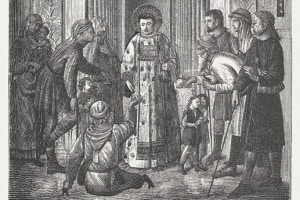San Lorenzo, diacono e martire romano, distribuisce le ricchezze della Chiesa ai poveri