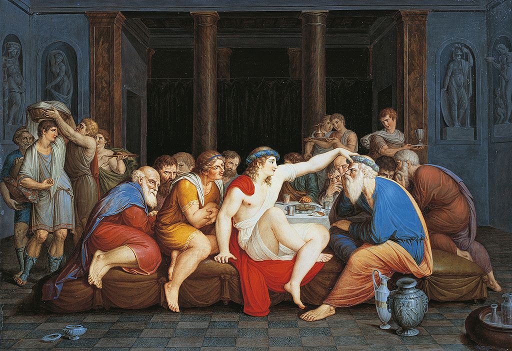Simposio di Platone: Socrate e i suoi compagni seduti intorno a un